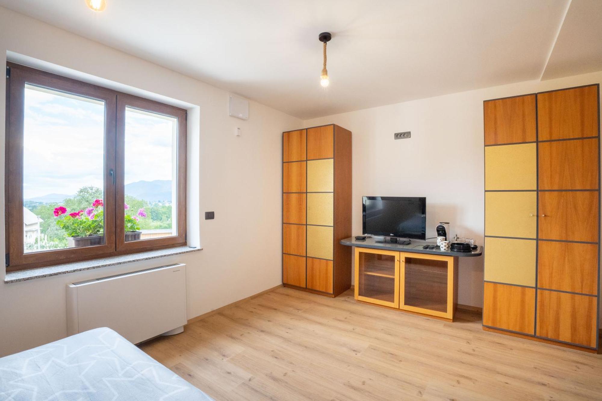 Aparthotel Hom At Vintgar Zgornje Gorje Rom bilde