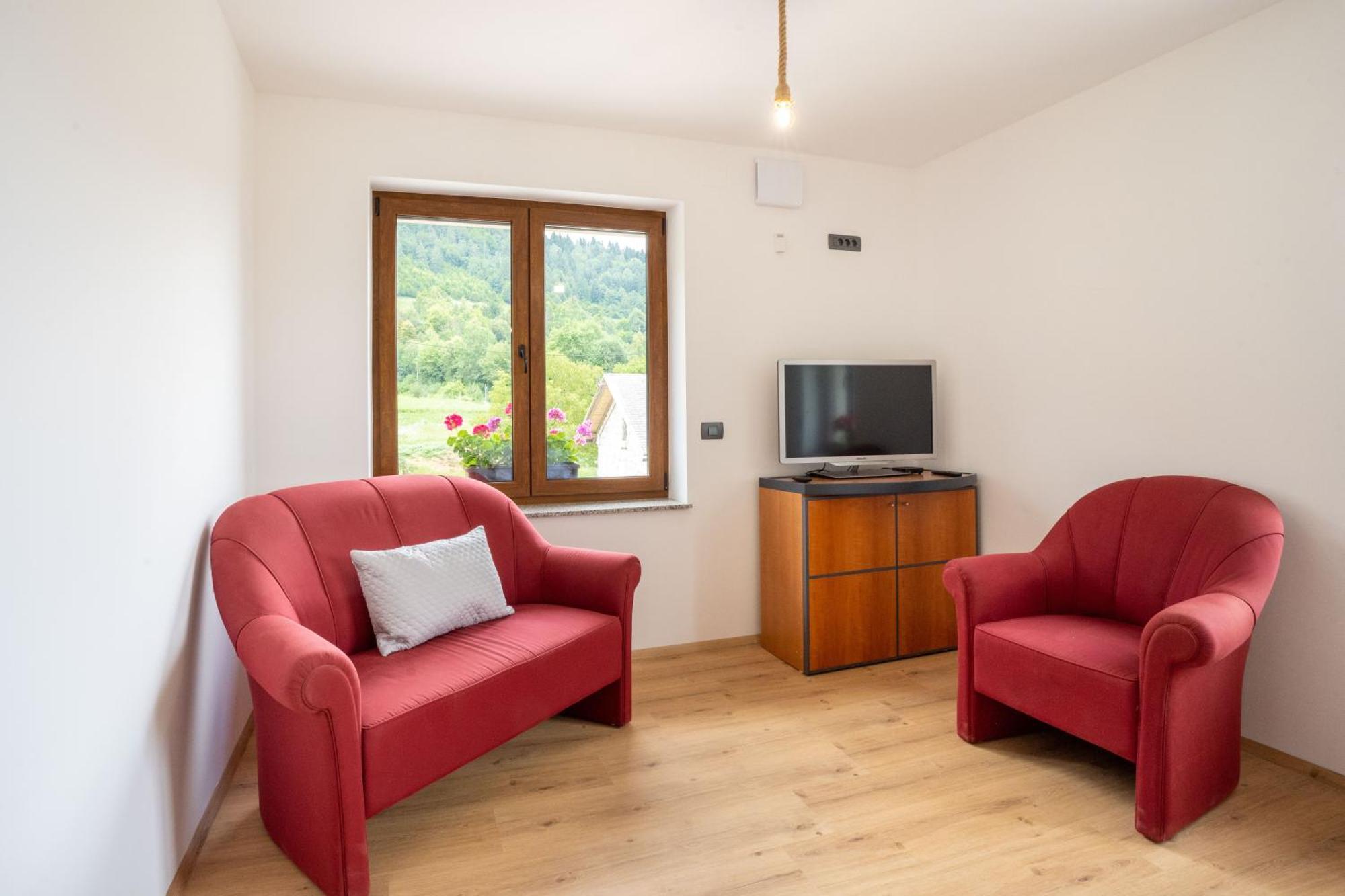 Aparthotel Hom At Vintgar Zgornje Gorje Rom bilde